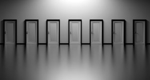 image of seven doors in a row